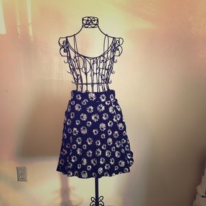 Black skirt with white daisies